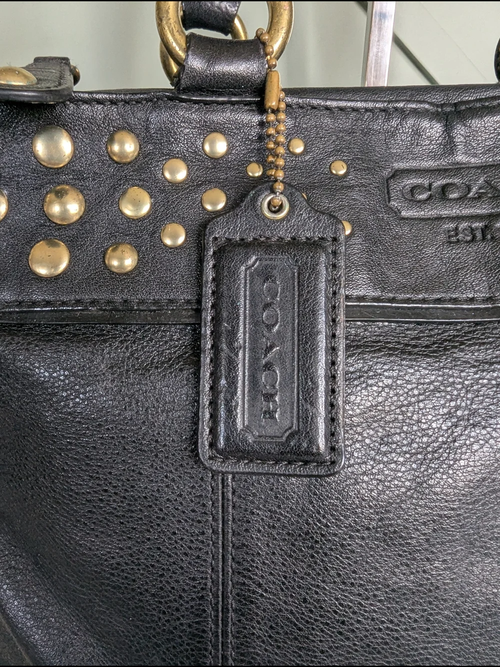 Coach Black Leather Shoulder Bag with Gold Stud Accents
